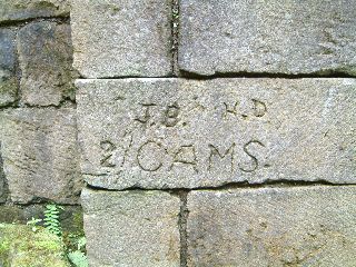 Military graffiti on a wall at Hermitage Castle